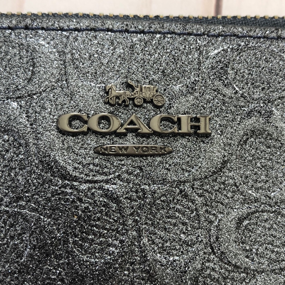 Sold!! Coach gun metal logo wristlet in charcoal - Picture 2 of 5